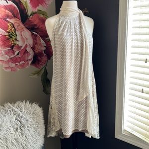 Lace halter dress. Elegant but fun cream colored.